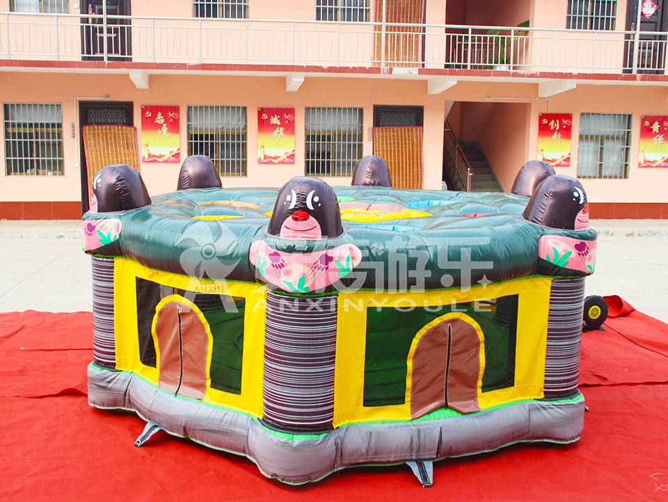 Inflatable whack a mole game