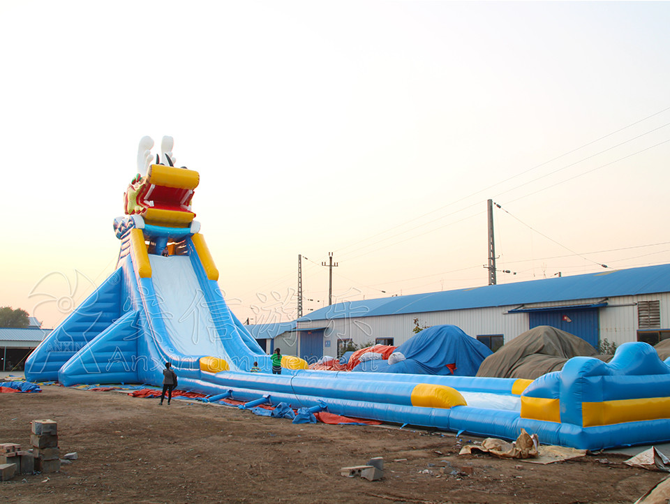 Giant inflatable water slide