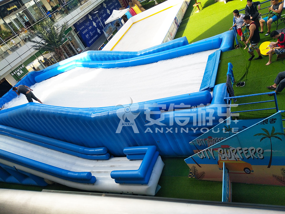 Inflatable single surf simulator