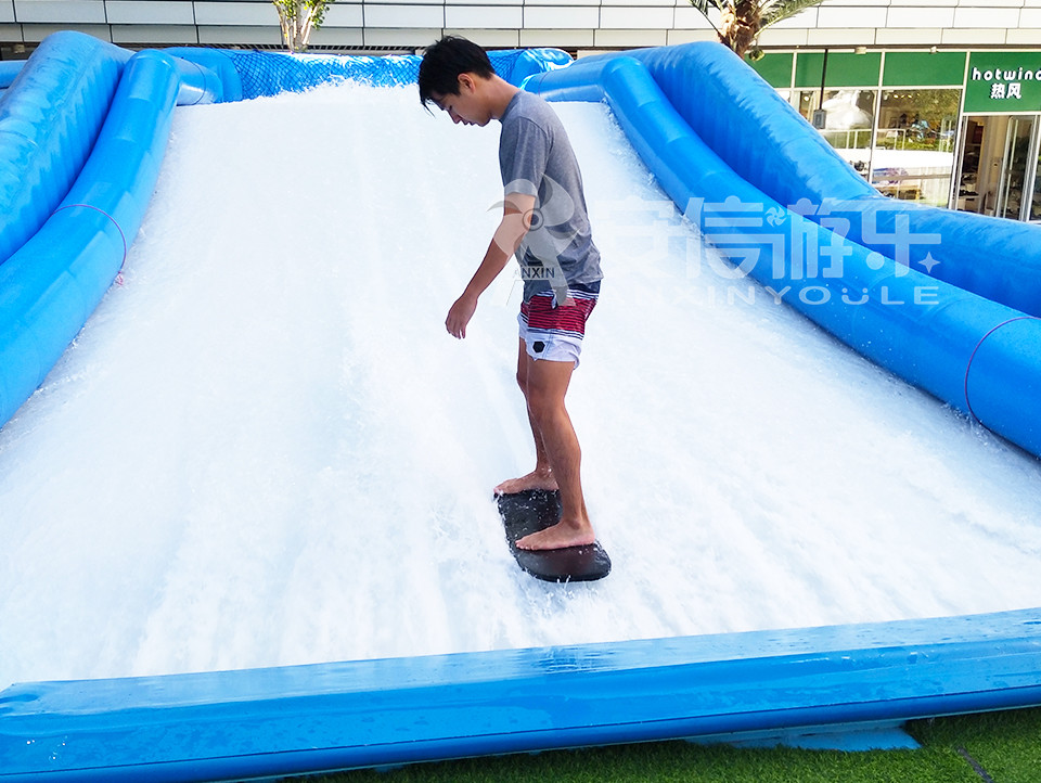 Inflatable single surf simulator